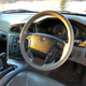 Everything inside the Volvo is beige, including the steering wheel leather.
